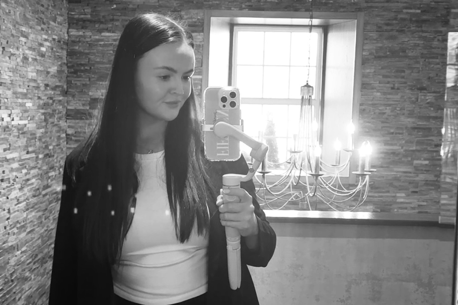 Black and white selfie of Fifteen Weddings & Events owner and wedding content creator Lianna